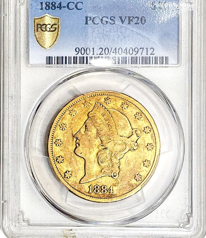 An 1884-CC gold coin in a PCGS VF20 slab, the kind of certified coin Denver collectors bring to sell
