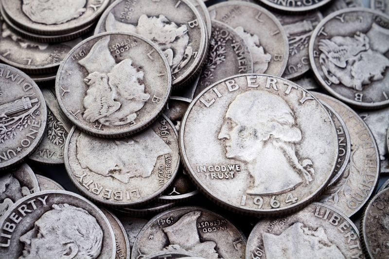 Pre-1965 silver quarters and dimes sorted for a private Denver silver coin appointment